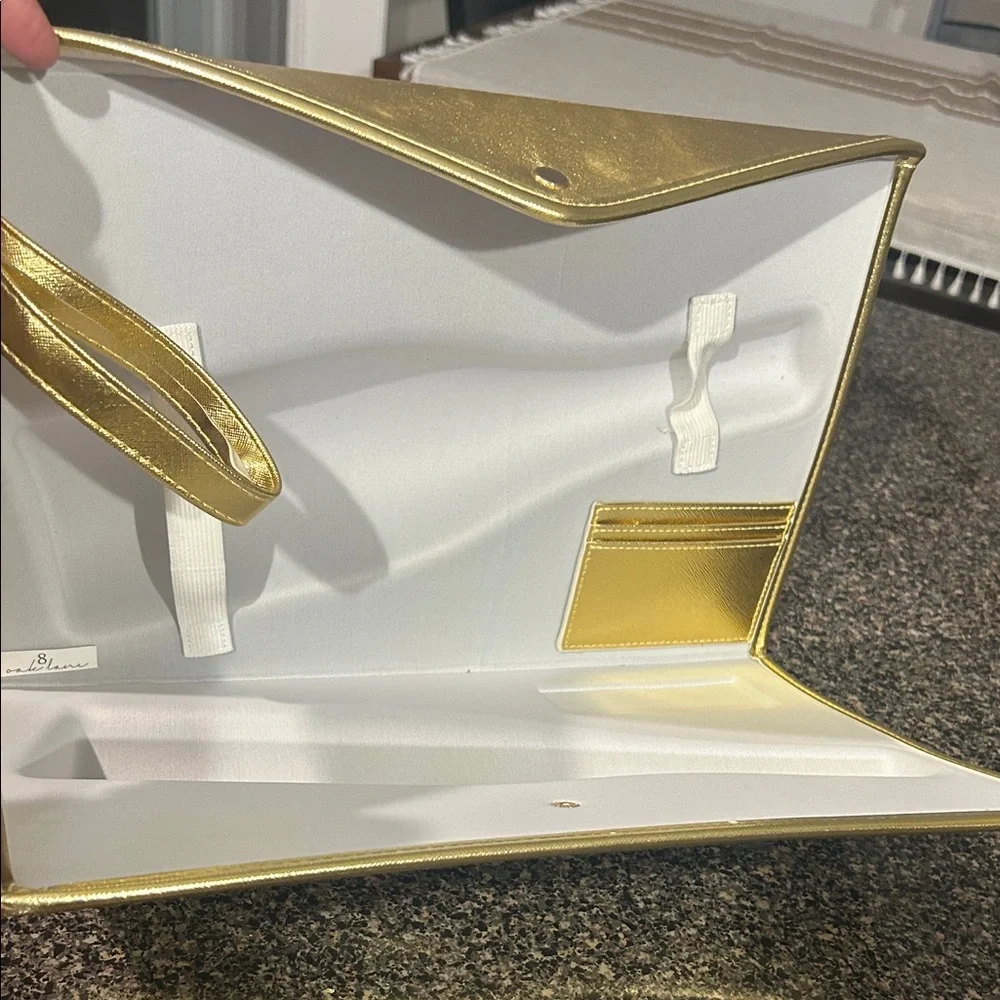 Gold Clutch Bag with magnetic close button!